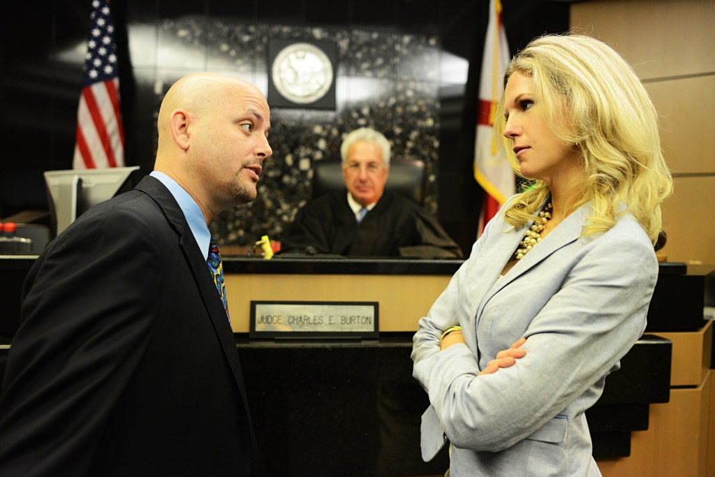 Attorneys Eddie Stephens and Cindy Crawford argue before the Honorable Charles Burton.